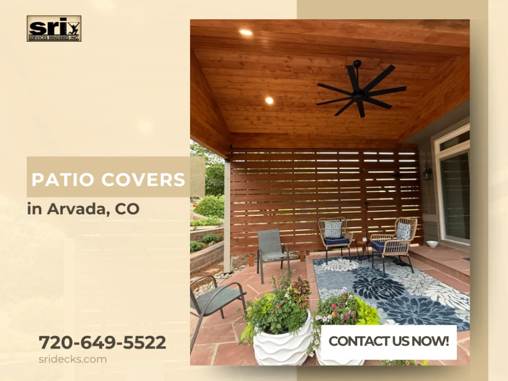 Wooden patio cover with seating area and ceiling fan in Arvada